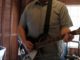 Brady playing guitar