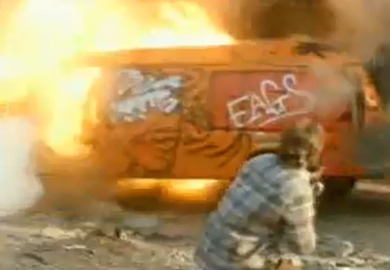 Van with "FAGS" painted on it