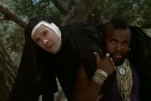 B.A. carries Murdock, who is dressed as a nun