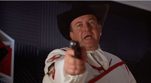 Tex Conway aims his gun