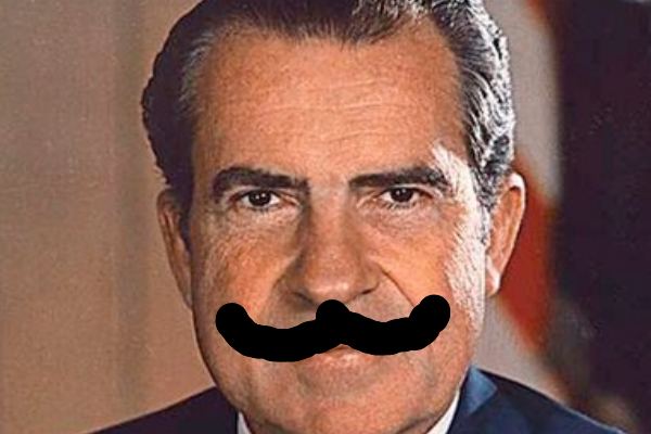 Richard Nixon with a big curly mustache