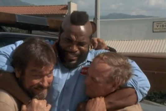 B.A. headlocks two thugs