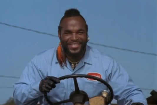 B.A. smashes a car and smiles