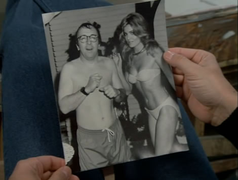 Neil Simon looking professor dude with last month's Playmate