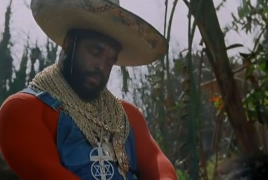 Unconscious B.A. rides a donkey and wears a sombrero