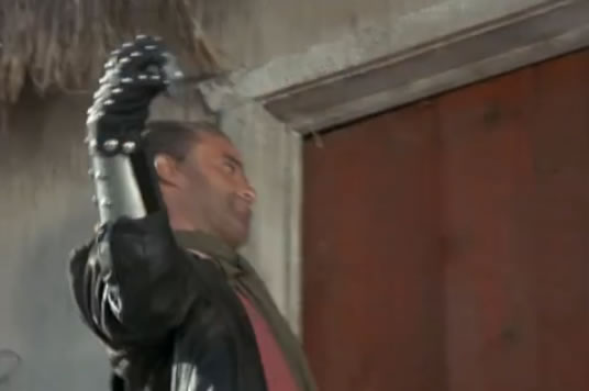 Vescari uses his robot hand