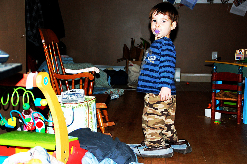 One year old wears Mama's slippers