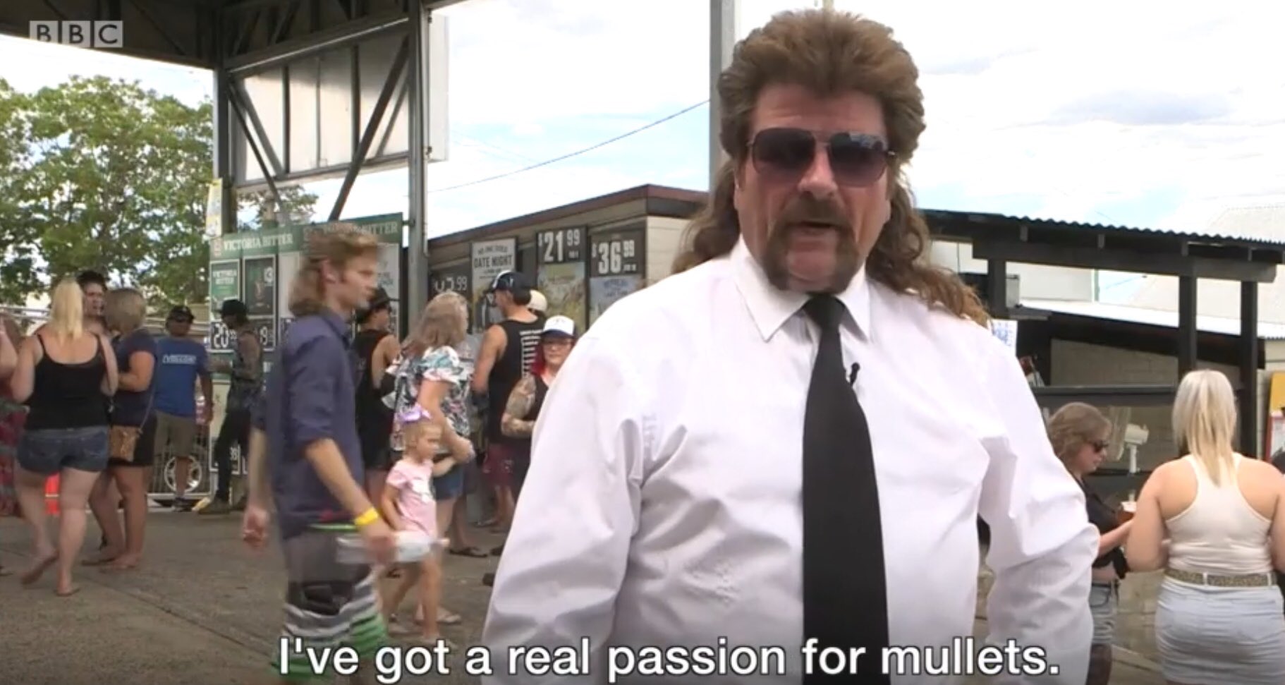 Man with giant mullet says "I've got a real passion for mullets."