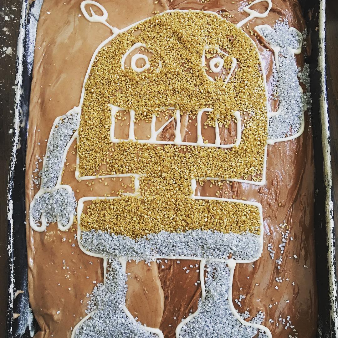 Chocolate cake with a robot on top