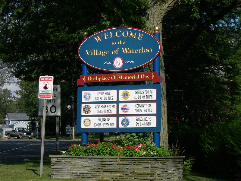 Sign says "Waterloo, NY: Birthplace of Memorial Day" (photo by Jimmy Emerson, DVM via Flickr/CC)