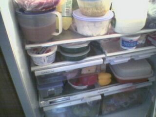 A fridge full of leftovers. (Photo by Carrie Nelson via Flickr/Creative Commons https://flic.kr/p/aHykfX)