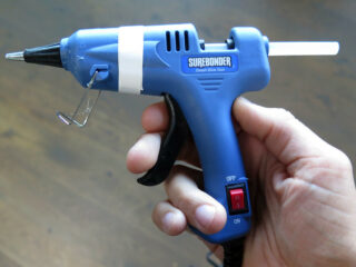 A mini hot glue gun. (Photo by Plusea via Flickr/Creative Commons https://flic.kr/p/GNcvT4)