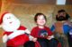 Two year old with Mr. T and Santa