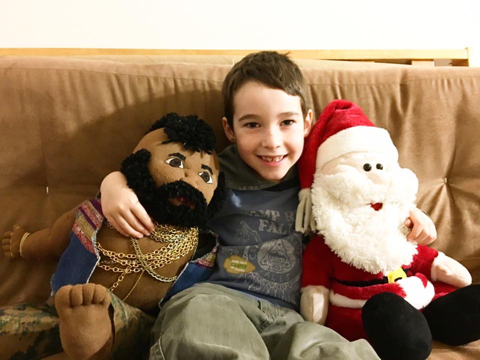 Five year old with Mr. T and Santa