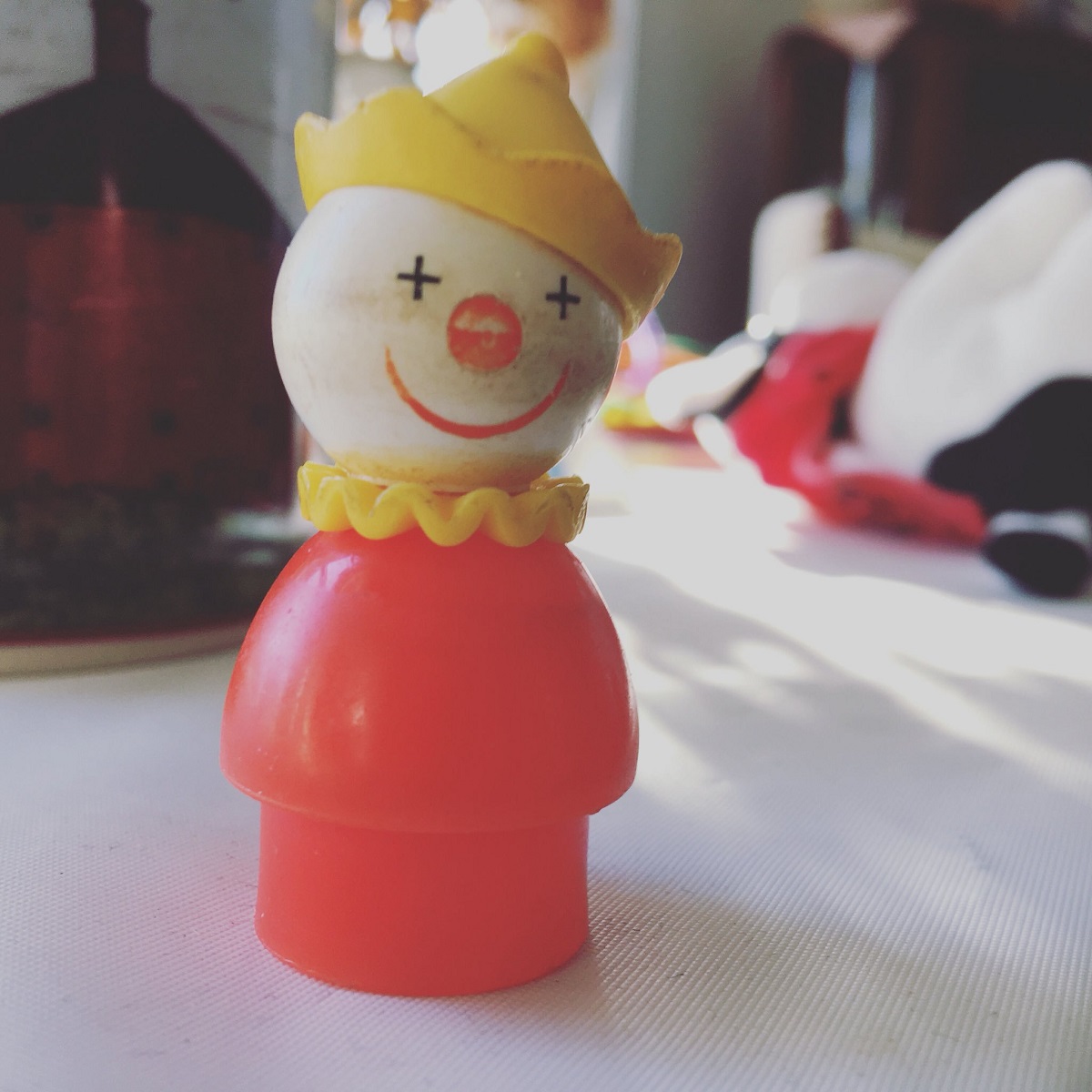 Fisher Price clown figure with Xs on its eyes