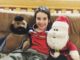 Six year old with Mr. T and Santa