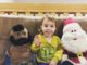 Almost two year old with Mr. T and Santa