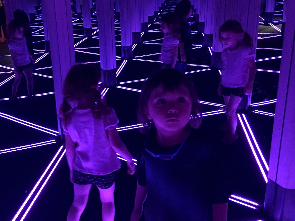 Two Carlson kids in the mirror maze
