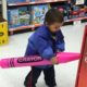 Two year old with giant crayons