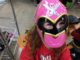 Three year old in a pink Power Ranger mask
