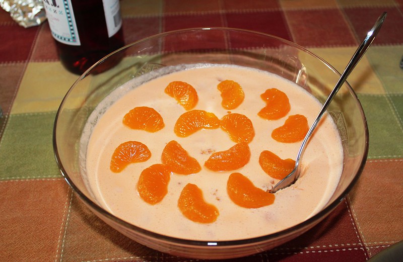 A Jell-o salad with orange slices floating on top. (Photo by Marcia O'Connor via Flickr/Creative Commons https://flic.kr/p/mz9thB)