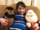 Eight year old with Santa and Mr. T