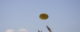 A yellow flying disk heads toward a pair of outstretched hands, trying to catch it. (Photo by nonrev via Flickr/Creative Commons https://flic.kr/p/6Bzgx)