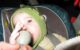 Baby boy tries to eat the microphone