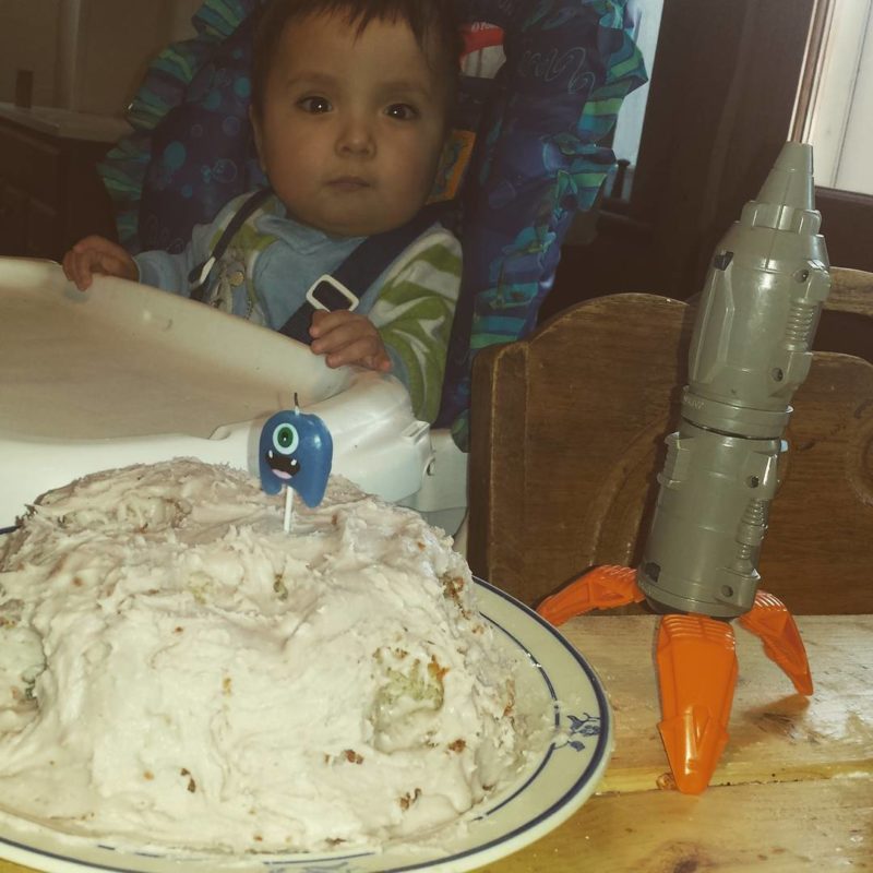 One year old and his moon birthday cake