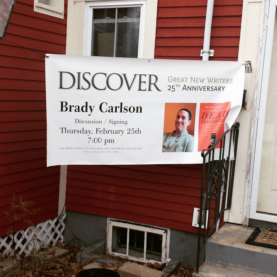 "Discover Brady Carlson" banner at the house