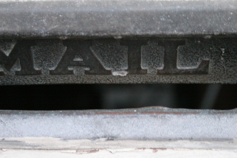 A metal mail slot, through which hopefully no child has ever gone through! (Photo by Orin Zebest via Flickr/Creative Commons https://flic.kr/p/4uBW66)