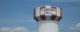 Water tower with red and white vertical stripes and the words "Florence Y'all" painted in black block letters. Photo by madaise via Flickr/Creative Commons https://flic.kr/p/5kyS3h