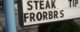 Restaurant sign advertises STEAK FRORBRS
