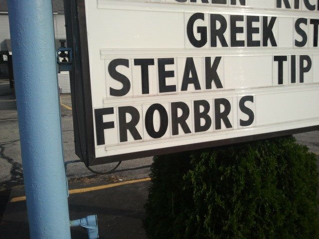 Restaurant sign advertises STEAK FRORBRS