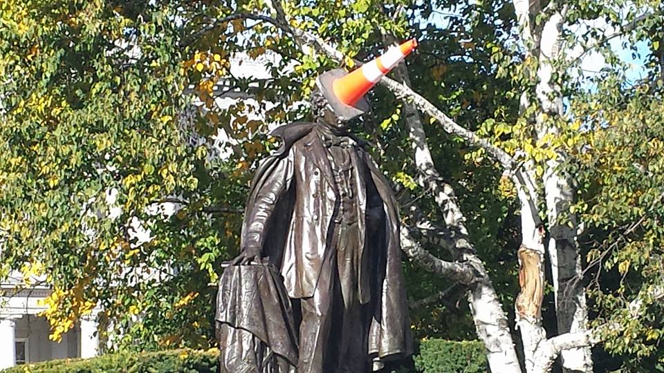 A traffic cone on the Franklin Pierce statue