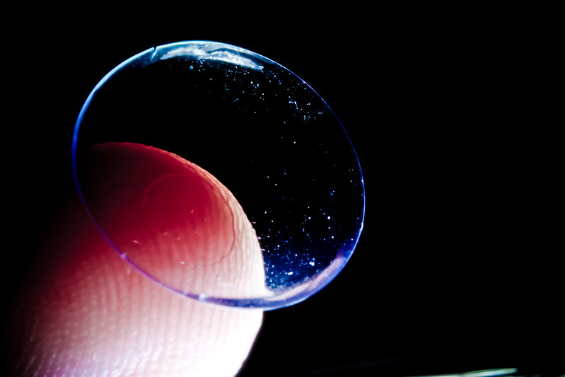 A contact lens on the tip of a finger. (Photo by n41 Photo via Flickr/Creative Commons https://flic.kr/p/9tcQic)