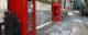 Red phone box in a town square, with another a few paces away. (Photo by It's No Game via Flickr/Creative Commons https://flic.kr/p/zmKNFE)