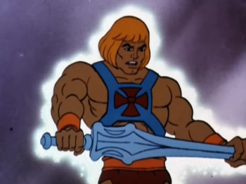 He-Man grasps his sword as he shouts I HAVE THE POWER!