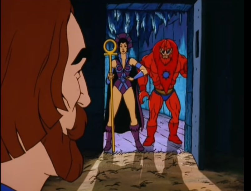 Randor looks on as Evil-Lyn and Beast Man explain the Shaping Staff