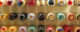 A wall of colorful skateboard wheels hanging on metal hooks. (Photo by Iain R via Flickr/Creative Commons https://flic.kr/p/6tkM7)