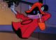 Orko is laying around in the air, drinking soda from a straw and using his right hand to direct tools off-screen. He looks very content.