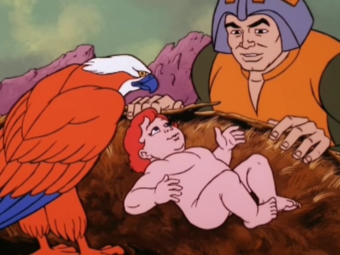 Sorceress, in falcon form, and Man-at-Arms, without a mustache, look at baby Teela in the nest.
