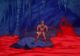 He-Man stands on an island of rock, while lava flows all around him