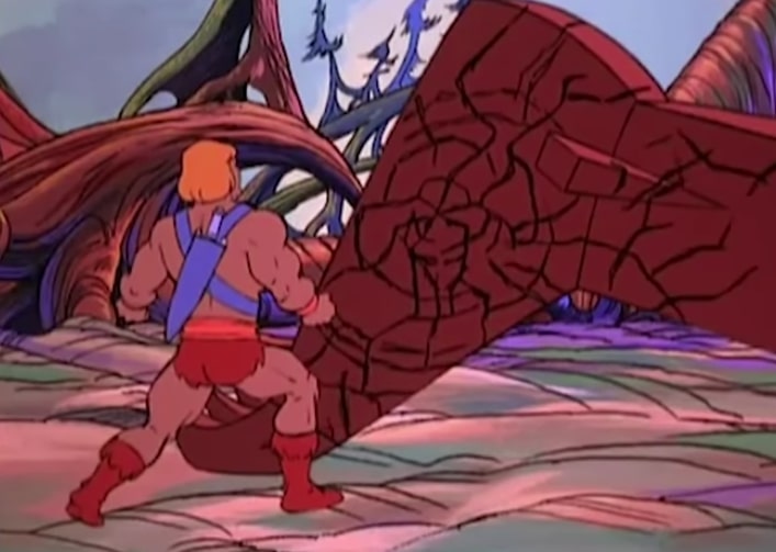 He-Man punches Colossor in the right foot, which starts to crumble