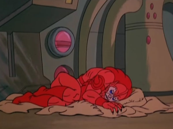 Beast Man sleeps on a pile of hay, or maybe a drop cloth