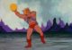 He-Man throws the Spellstone, which is a glowing yellow ball