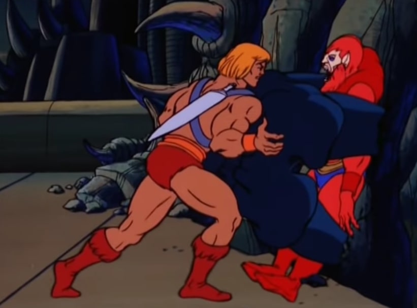 He-Man traps Beast Man against a wall