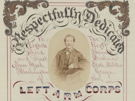 A paper with a photo of a man says "Respectfully Dedicated - Left Arm Corps" - via Library of Congress https://www.loc.gov/resource/mss13375.00507/?sp=20