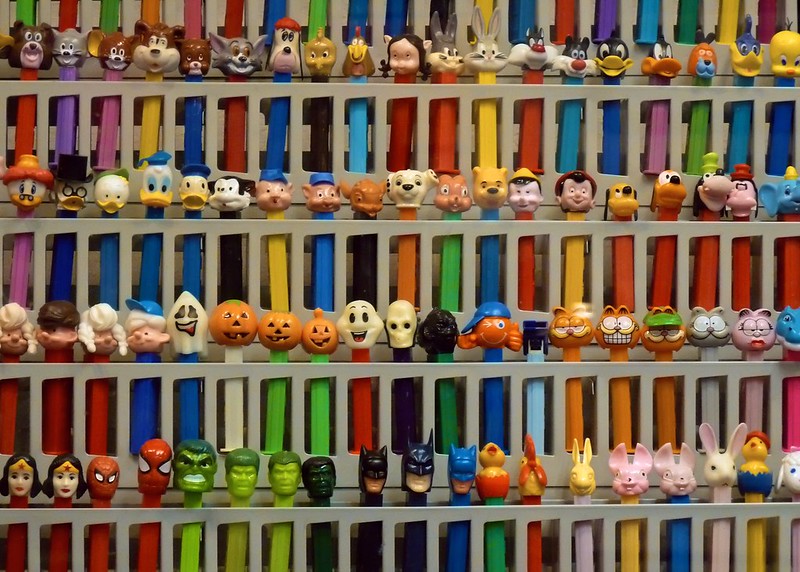 A wall of PEZ dispensers at the Burlingame PEZ Museum. (Photo by Ingrid Taylar via Flickr/Creative Commons https://flic.kr/p/6ge88i)