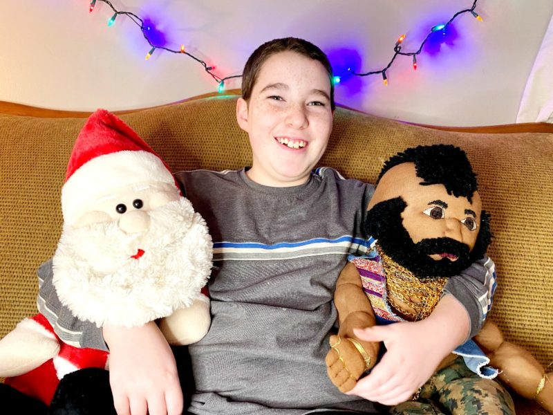 Ten year old with Santa and Mr. T